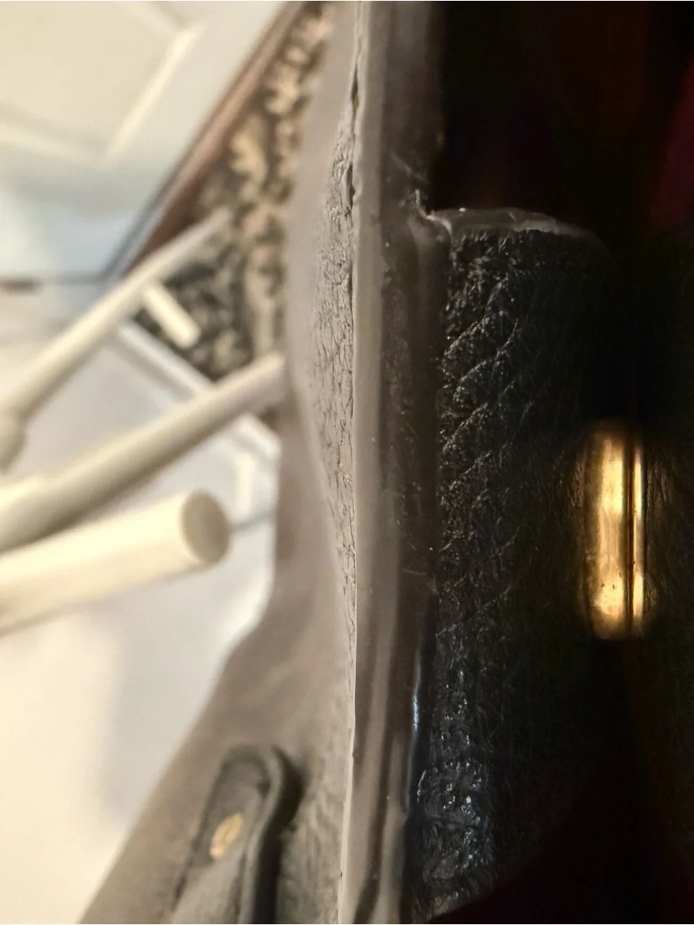 This is a Coach Field Tote in Truffle Black with a horse and carriage print